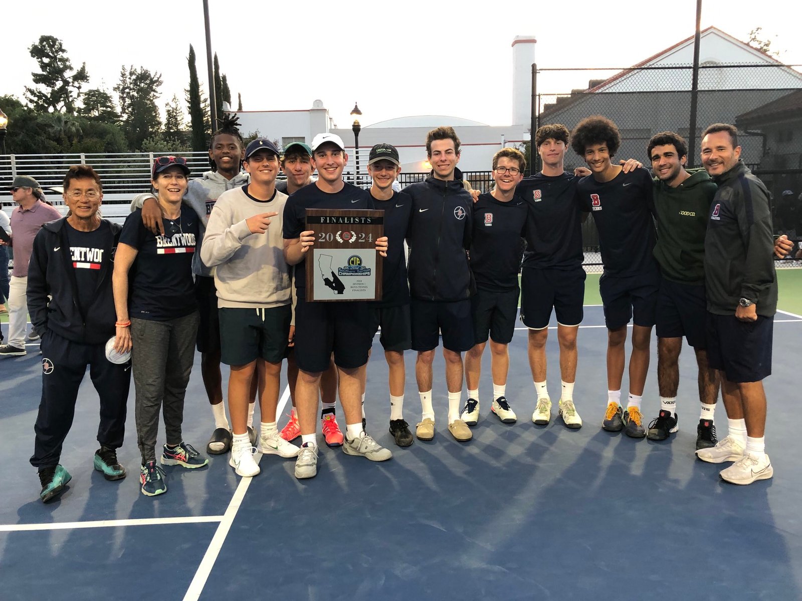 Varsity tennis captain 2 (allowed sub to hold trophy)